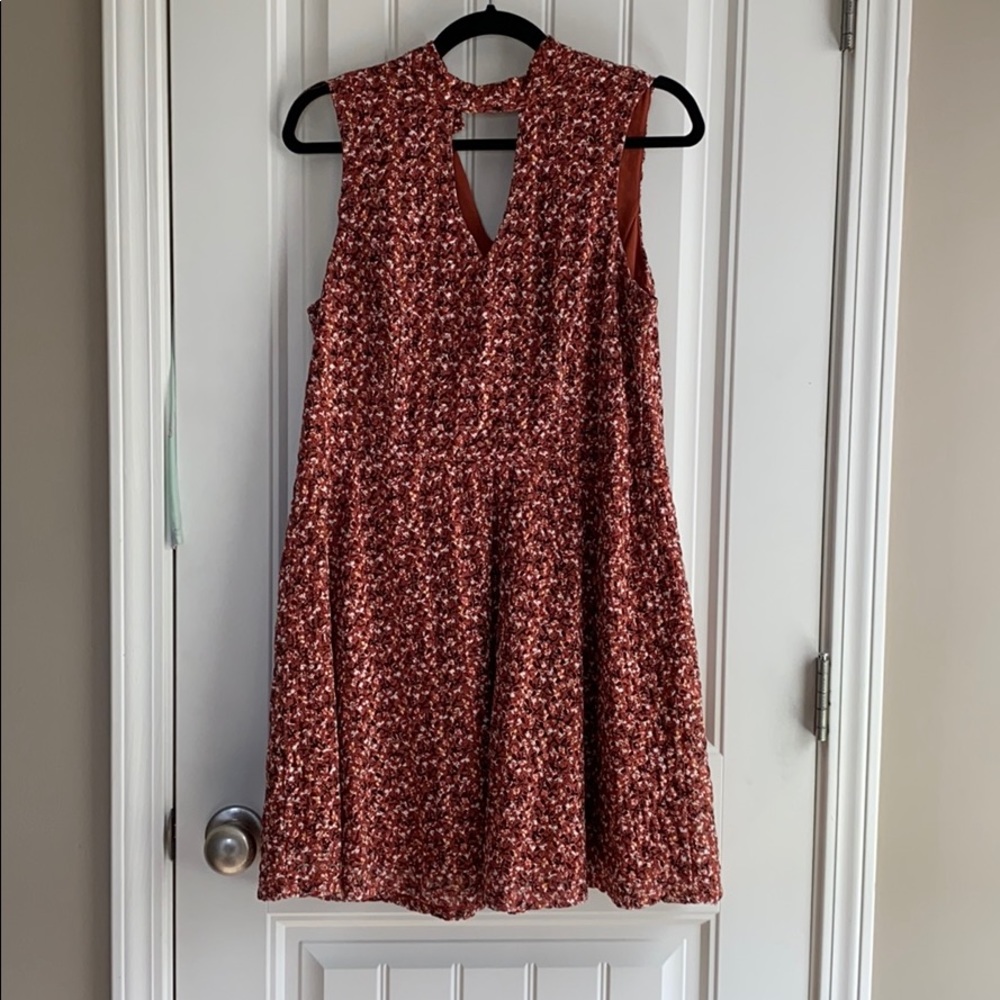 High neck, sleeveless dress